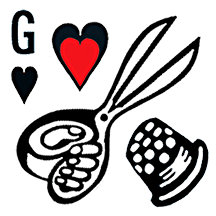 Gwendolyne Hats box of a thimble scissors a heart and the letter G